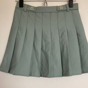 Light green pleated skirt tennis style